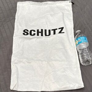 SCHUTZ White Dust Bag with Black Logo